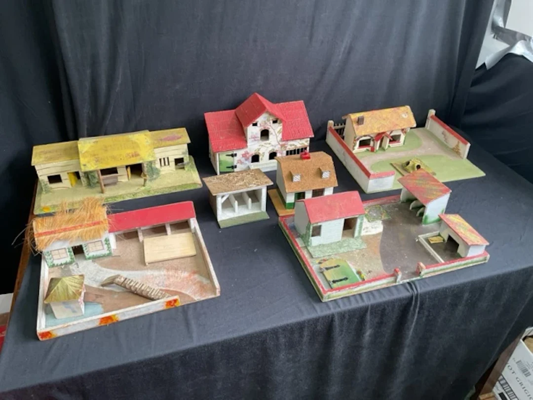 Various painted wood farm buildings - stables, cow bares, outbuildings