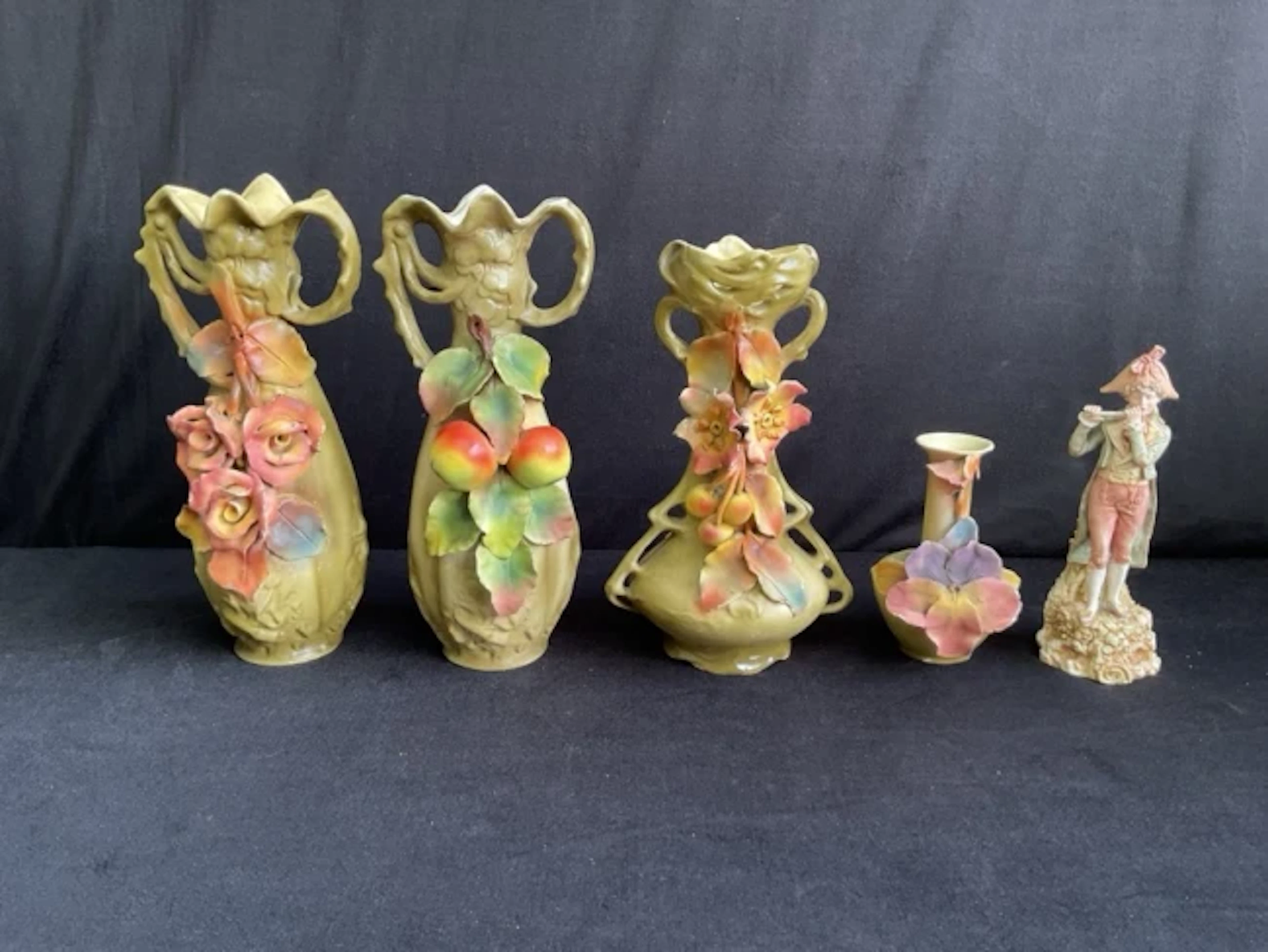 A group of Royal Dux ceramics comprising a pair of art nouveau vases