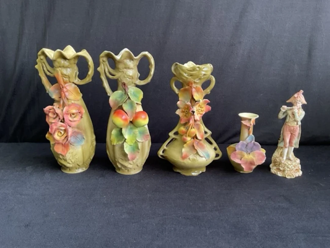 A group of Royal Dux ceramics comprising a pair of art nouveau vases