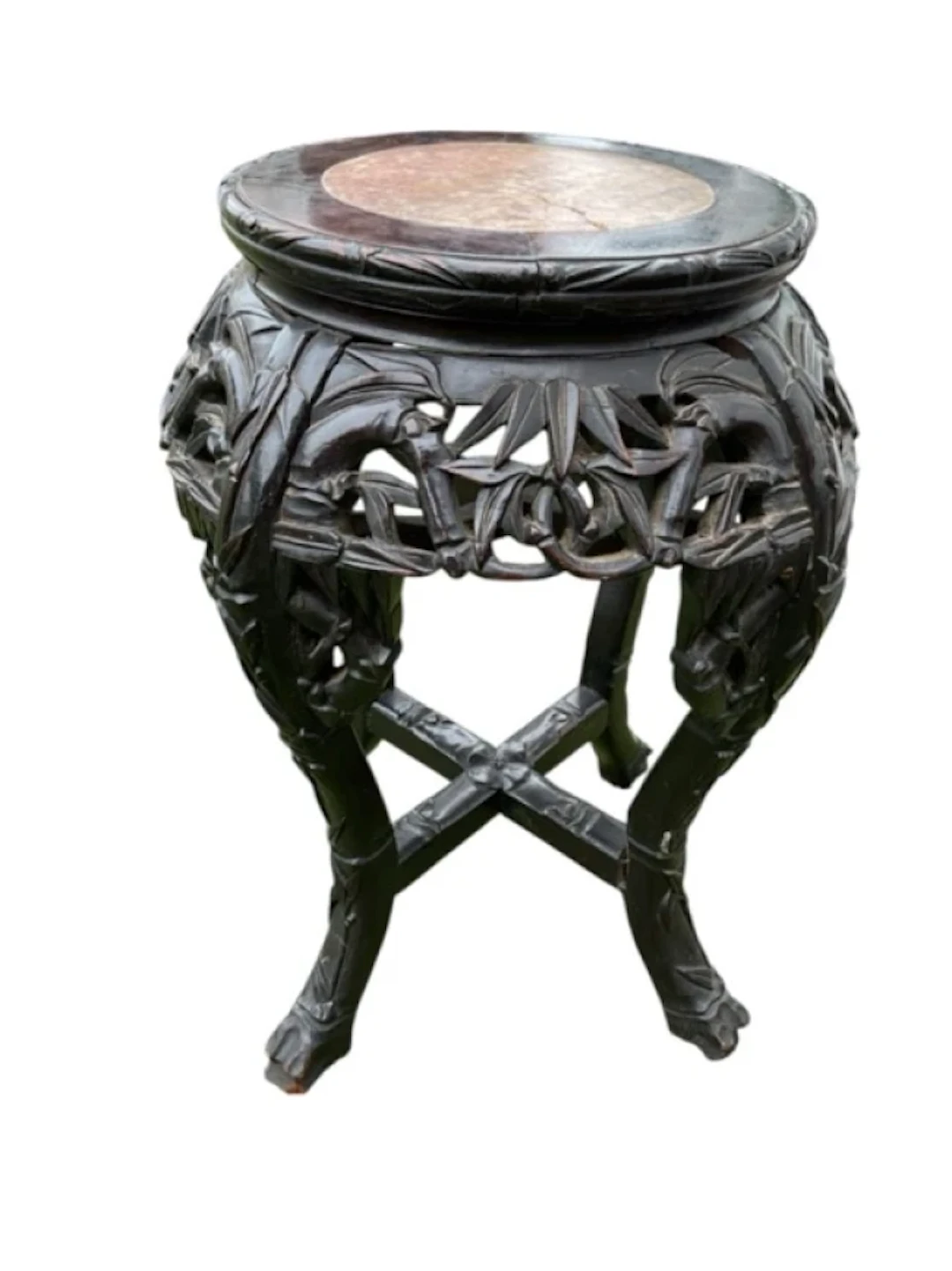 A nineteenth century carved Japanese jardinière stand with circular