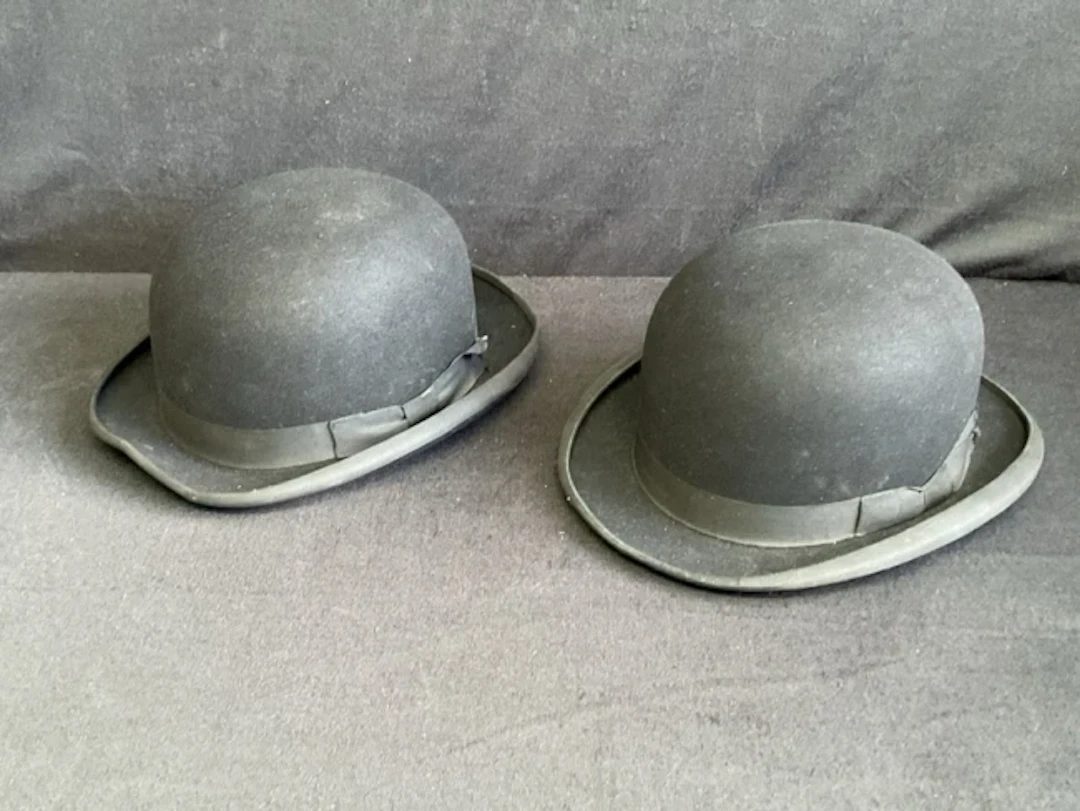 A Christys bowler hat - size 7.3/8ths with sprung wood press; and