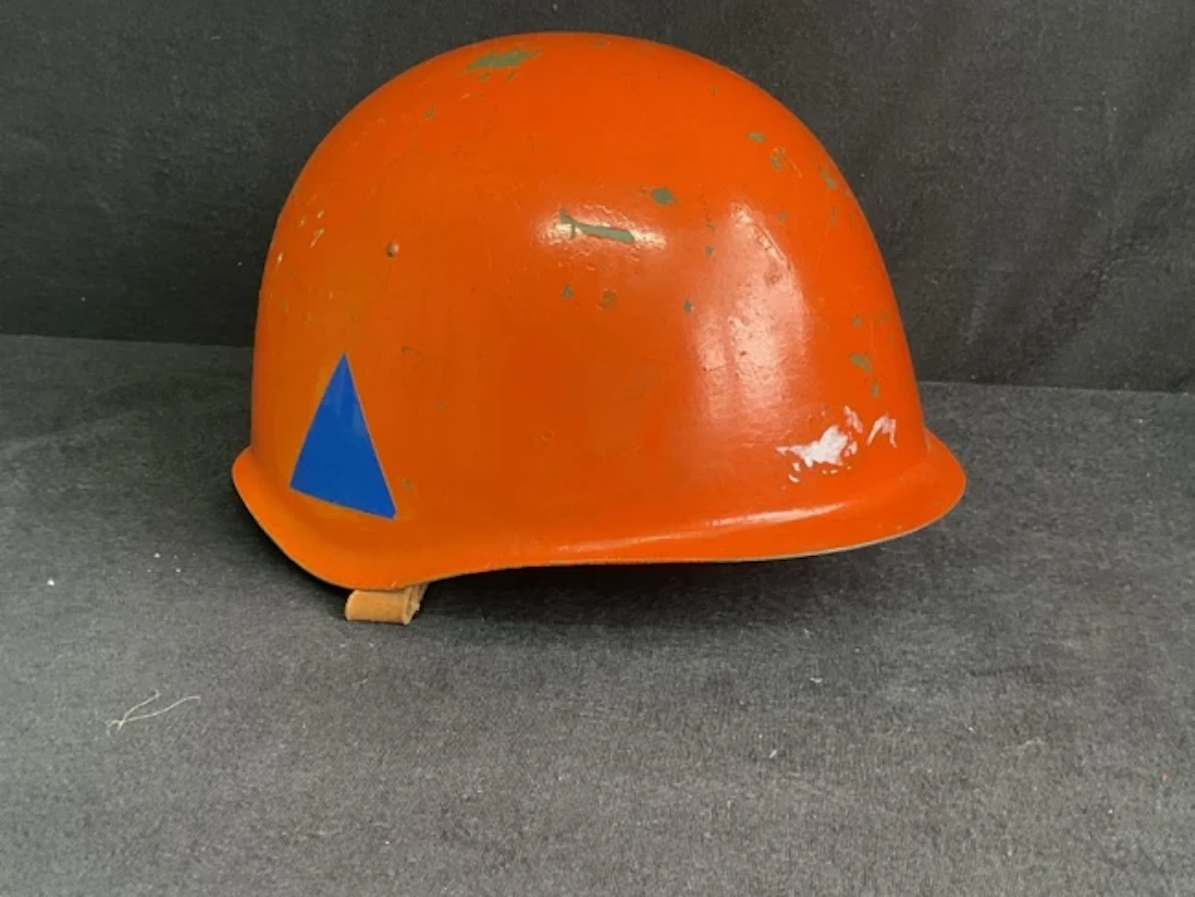 A 50s Czechoslovakian orange Civil Defence Marines steel helmet with
