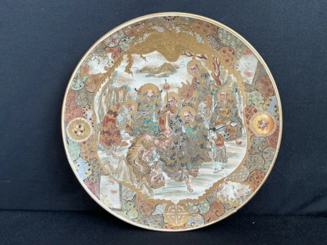 A Meiji period Japanese Satsuma charger handpainted with deities watching