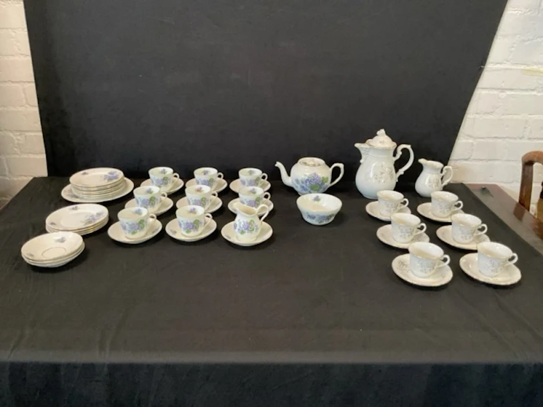 A 20s Victoria China teaset decorated with violets; and a Classic