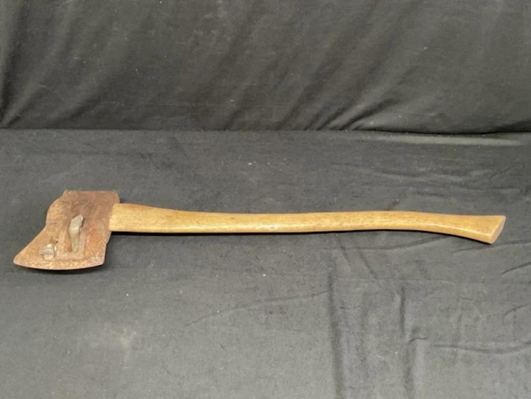 A cast iron 7lb splitting axe on a hickory handle. (30in)