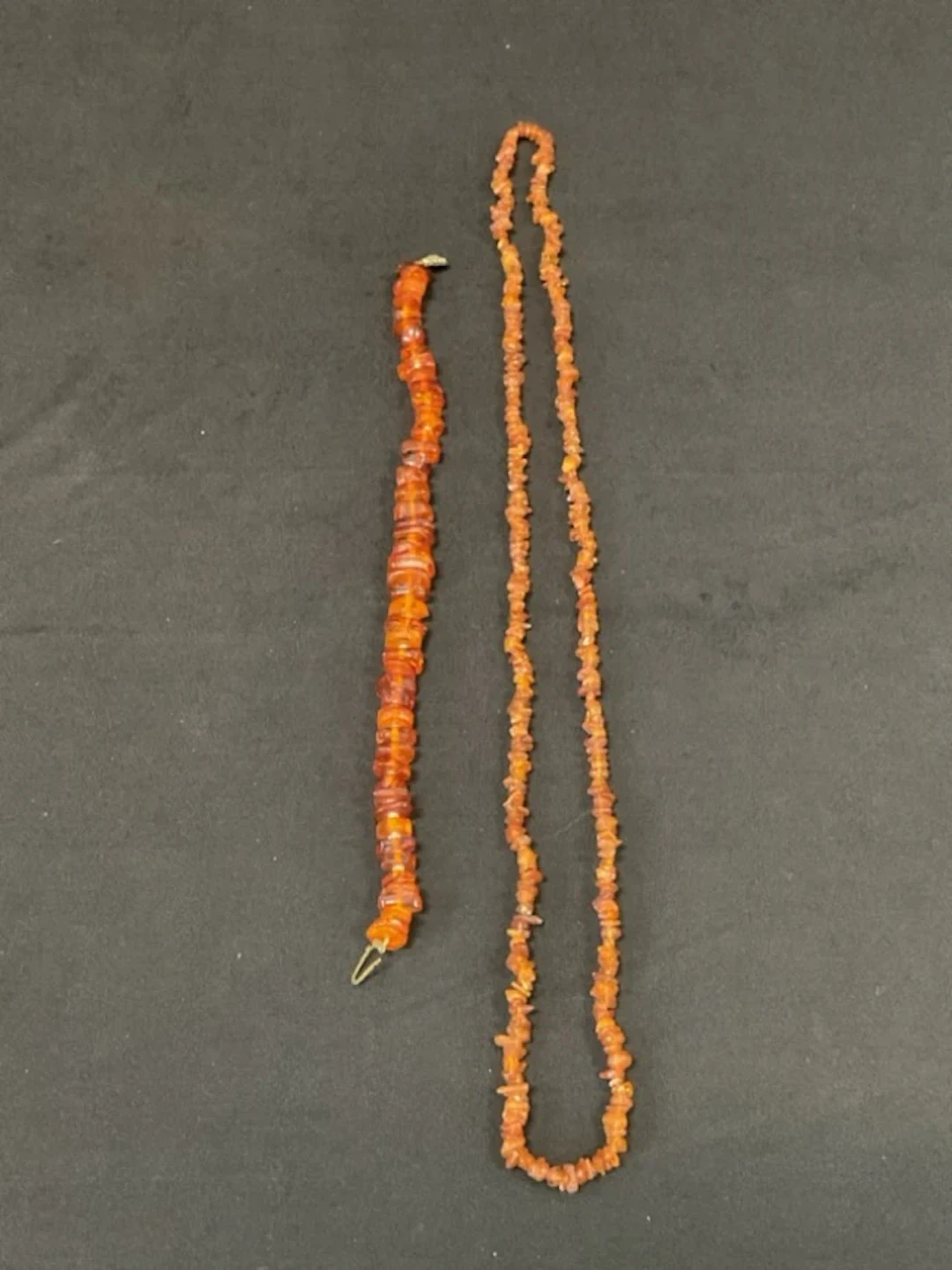 A 16in cognac amber choker necklace with irregular disc beads interspersed