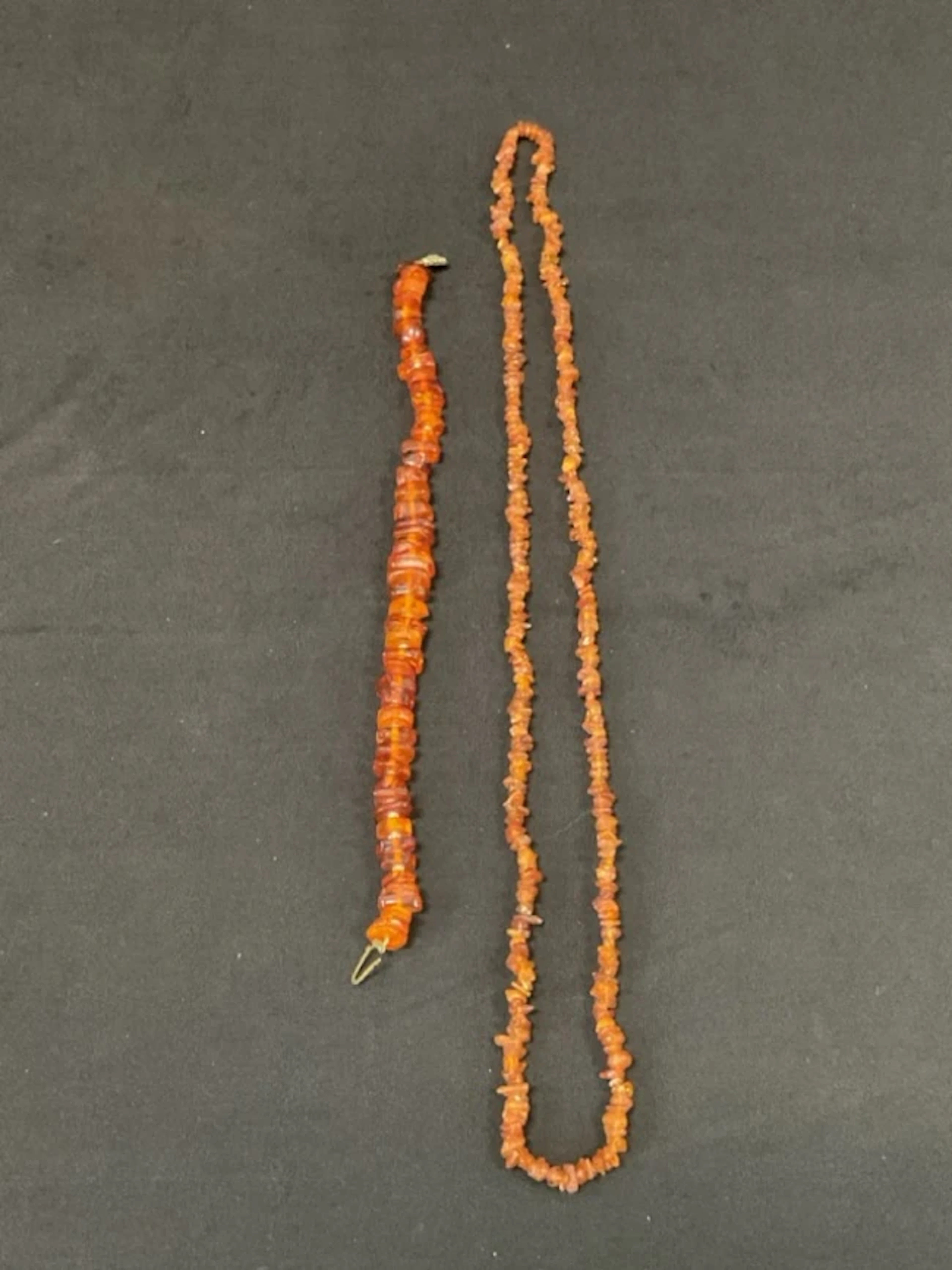 A 16in cognac amber choker necklace with irregular disc beads interspersed