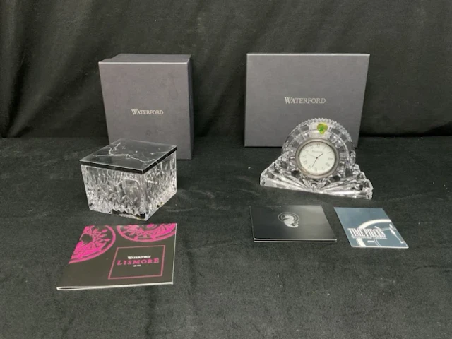 A boxed Waterford cut crystal square trinket box with white veined