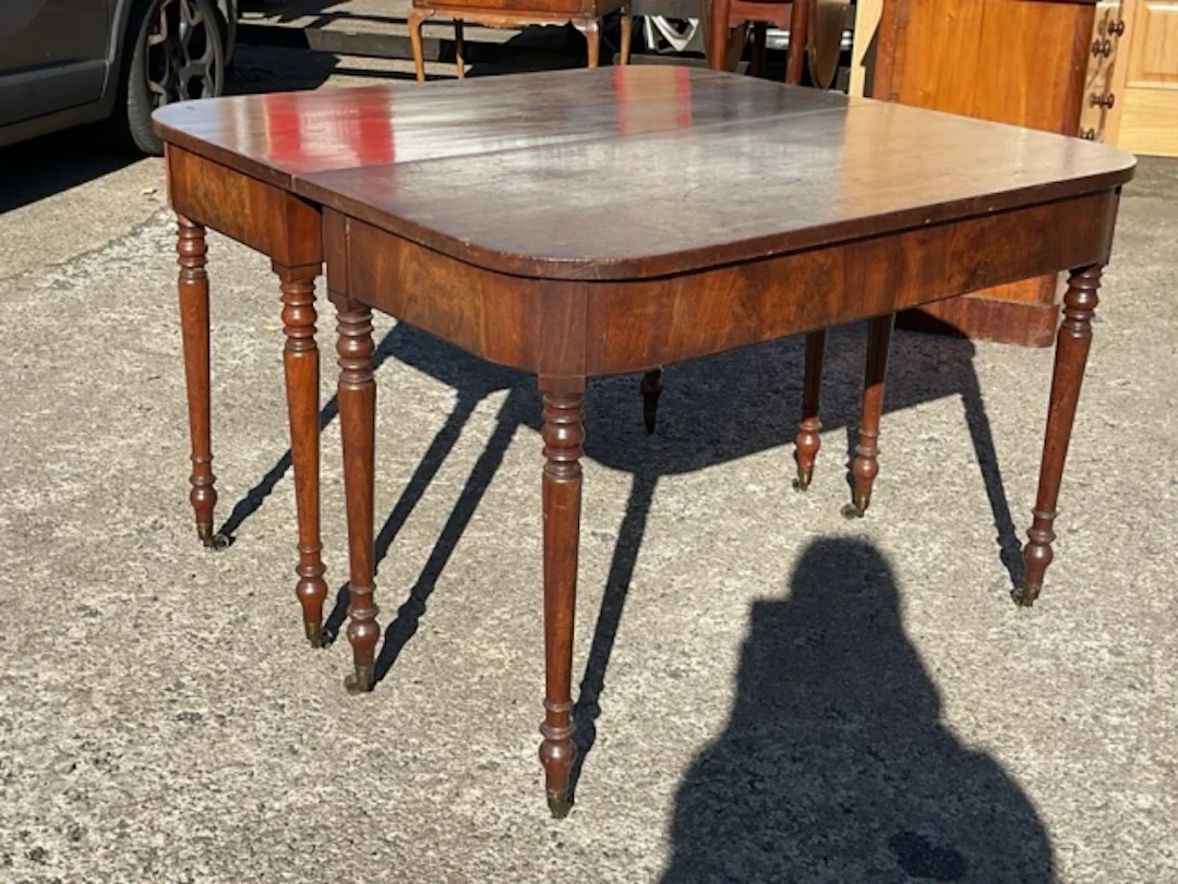A pair of regency mahogany side tables, forming a square supper table