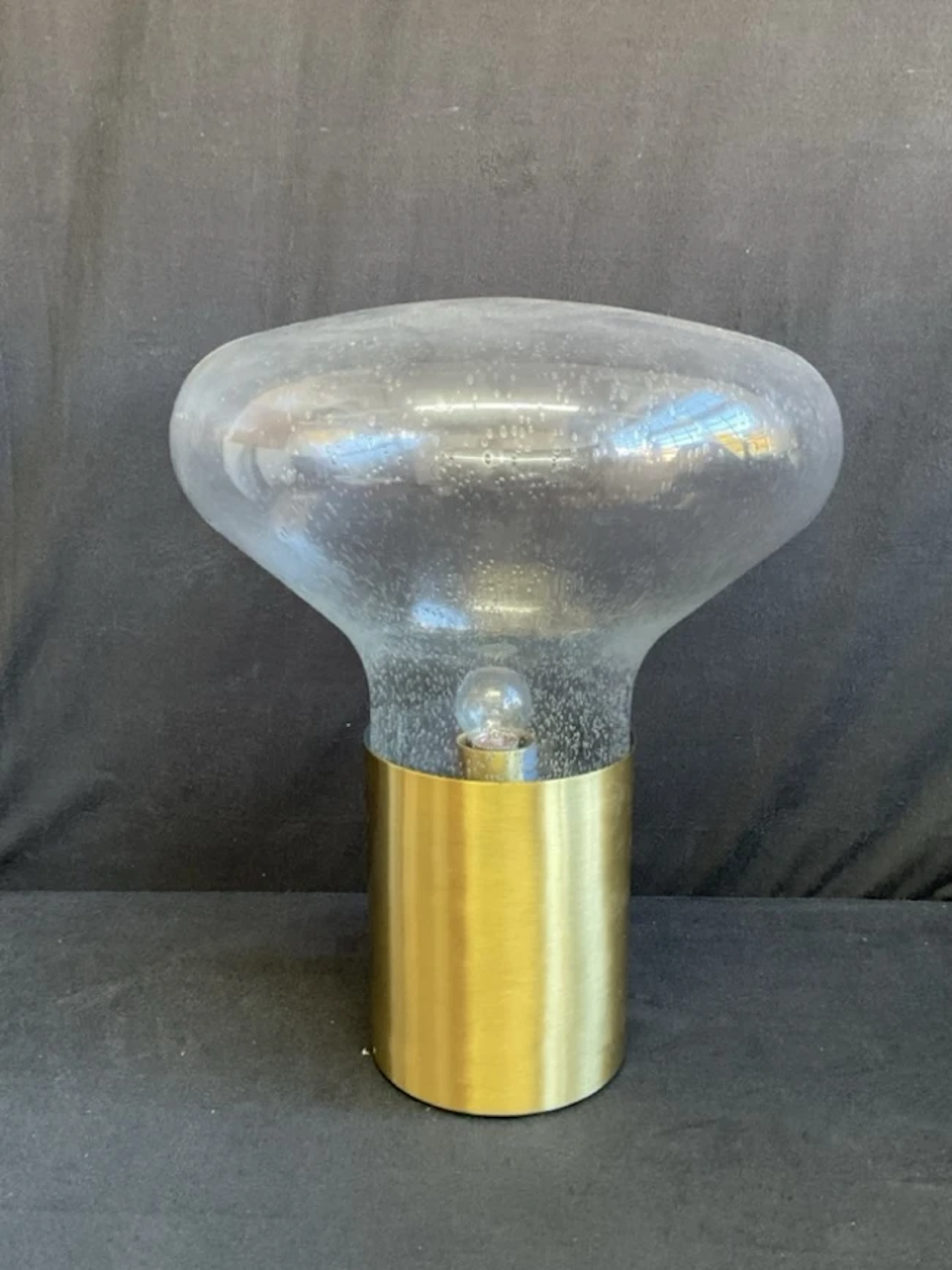 A Habitat Marlow tablelamp with mushroom shaped bubble glass shade