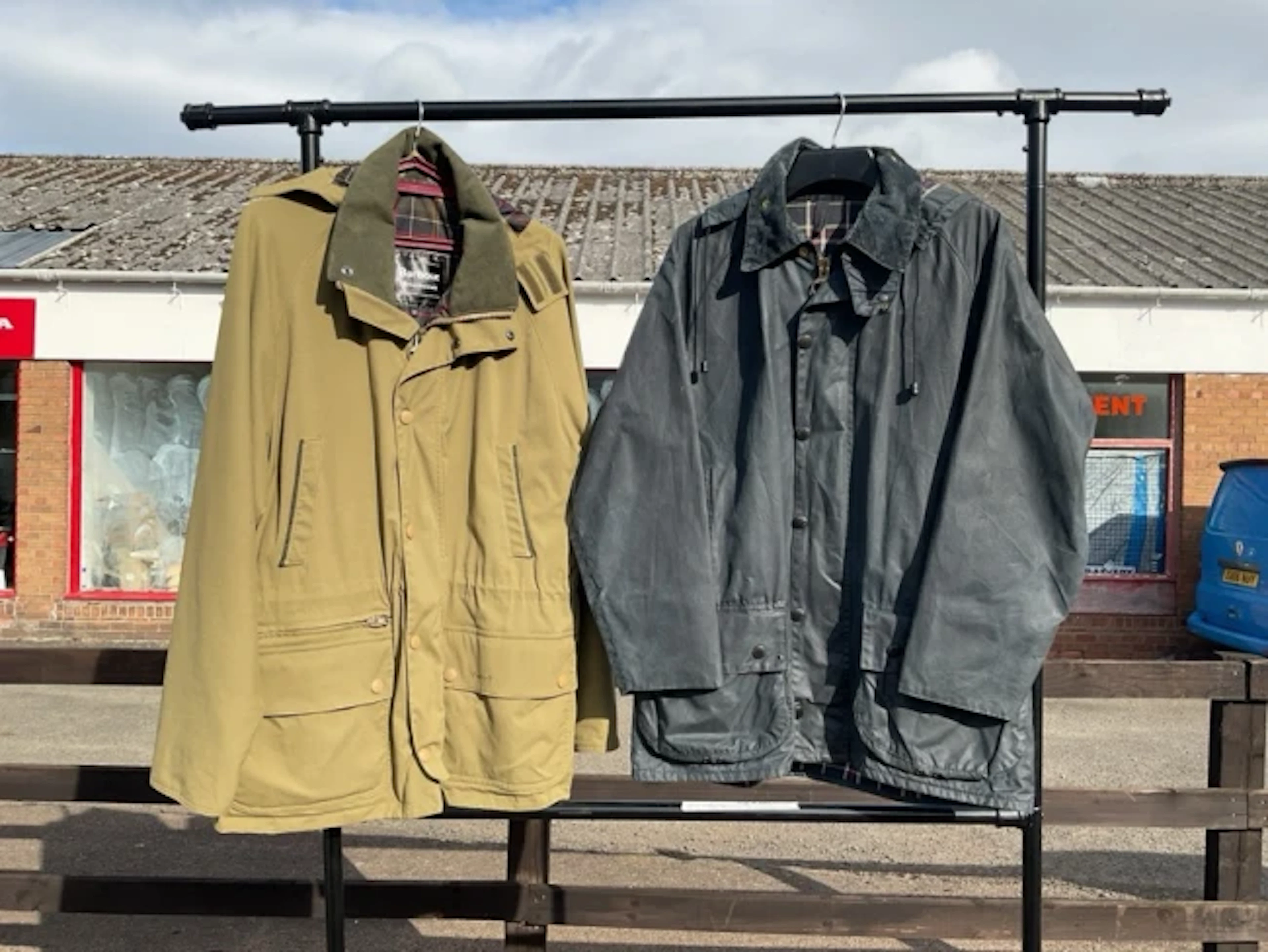 A “nearly new” Barbour navy Beaufort jacket with detachable hood -
