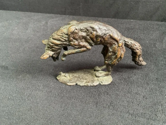 Jan Sweeney, bronze, a fox pouncing on a rodent, titled Leaping Fox