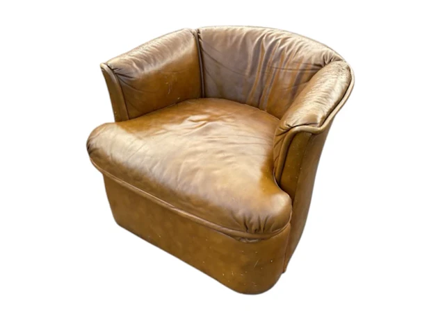 A leather upholstered tub armchair by Drexel, with rounded back and