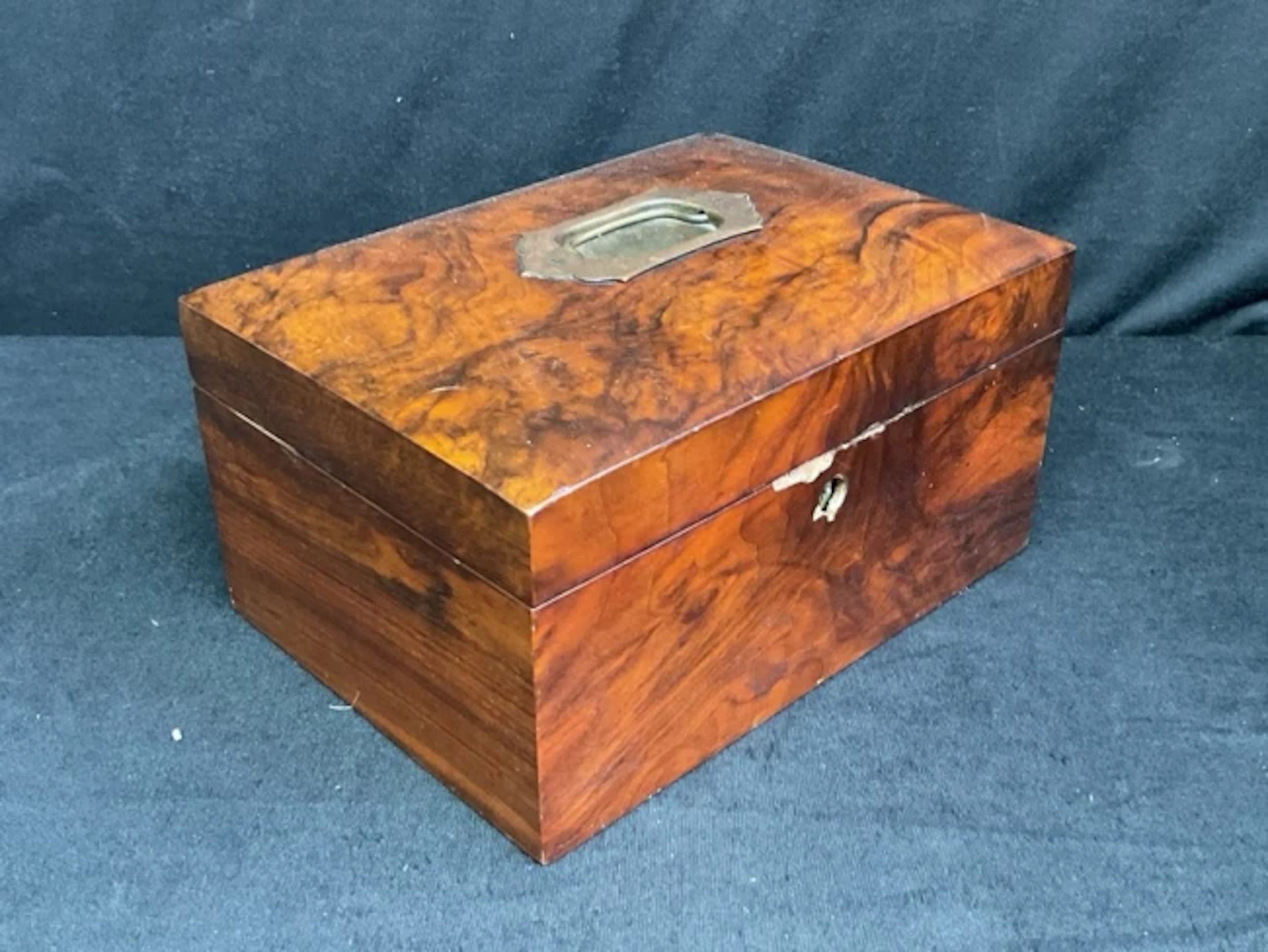 A domed rectangular Victorian walnut sewing box with brass military