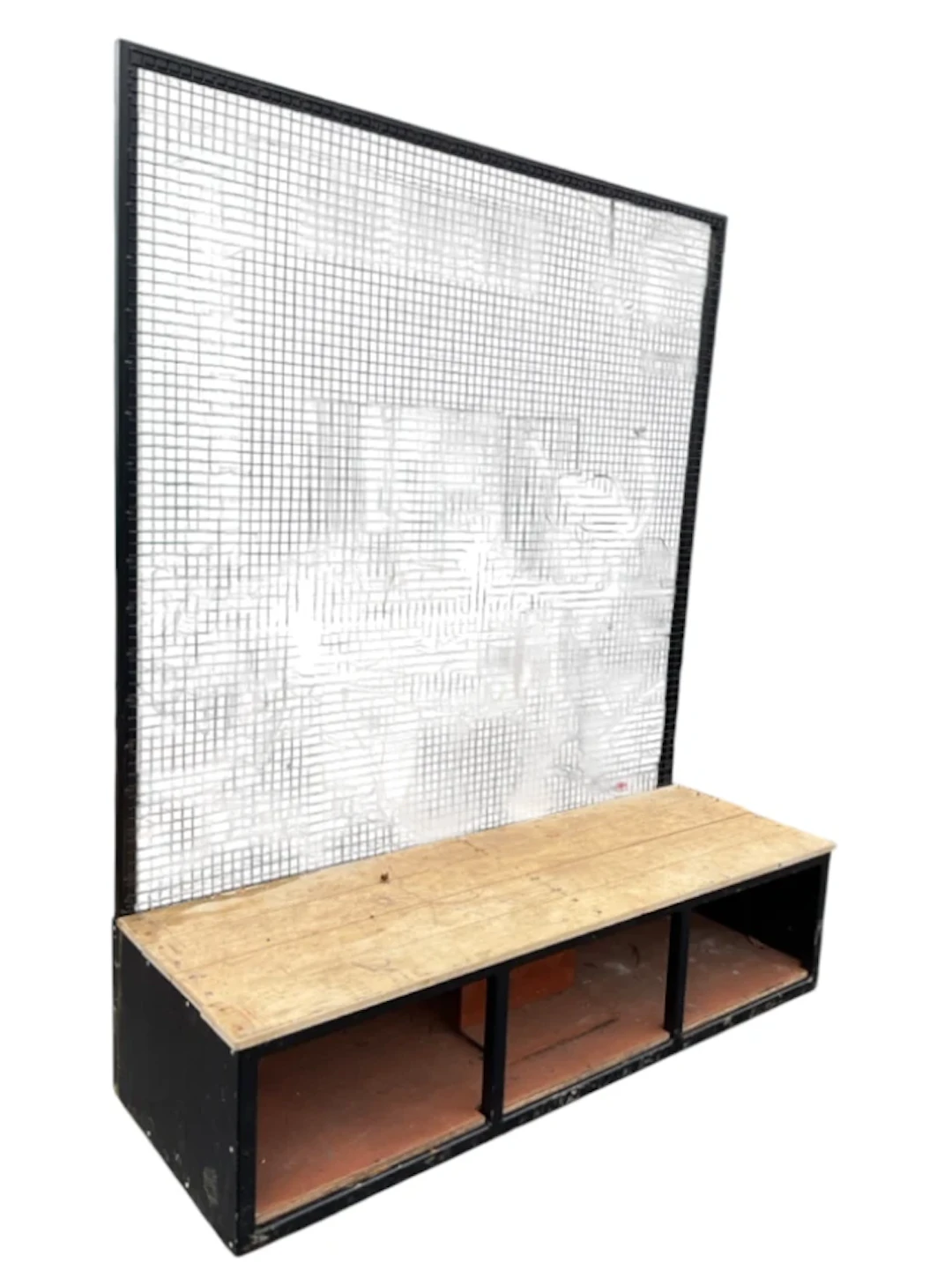 A garden bench with hardwood boarded seat above open sided frame