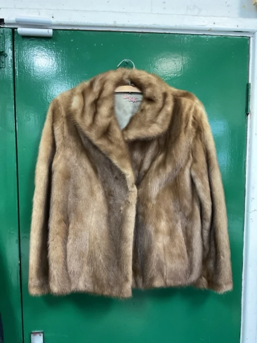 A mink fur jacket by Edelson, with wide collar and branded satin lining