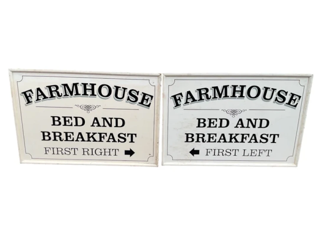 A pair of rectangular painted Farmhouse Bed and Breakfast signs, with