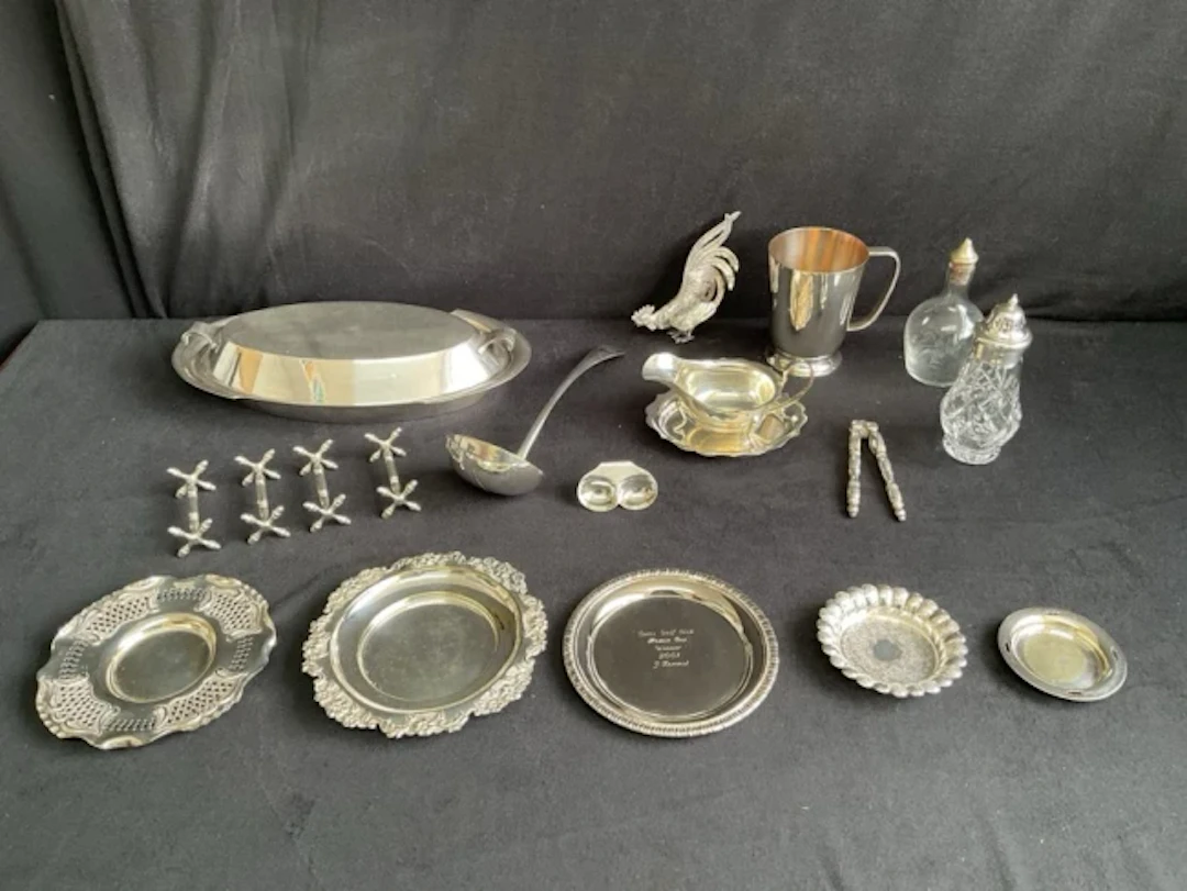 Miscellaneous silver plate - a set of four knife rests, a ladle, a