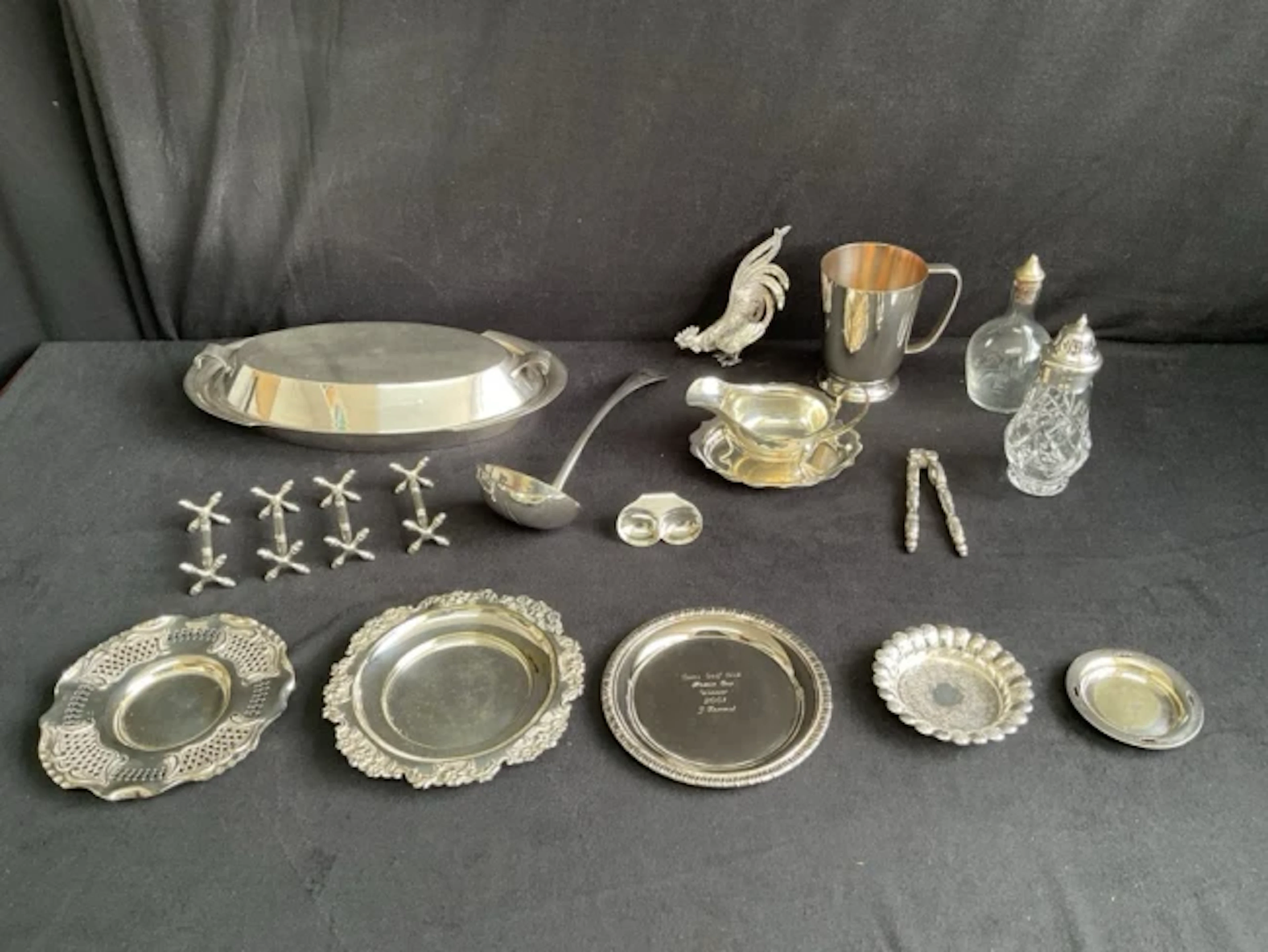 Miscellaneous silver plate - a set of four knife rests, a ladle, a