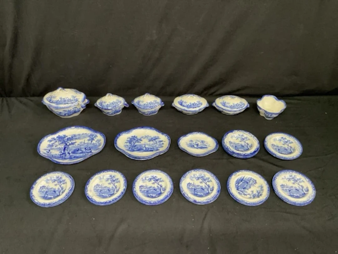 A Ridgeways blue & white miniature dinner service decorated in the