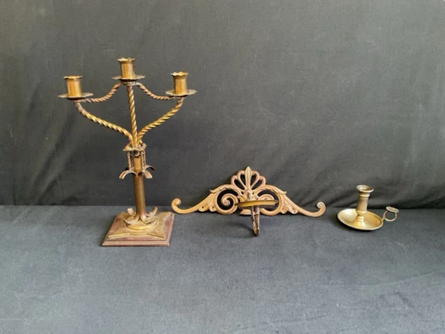 A Victorian gothic brass three-light candelabra; a regency style cast