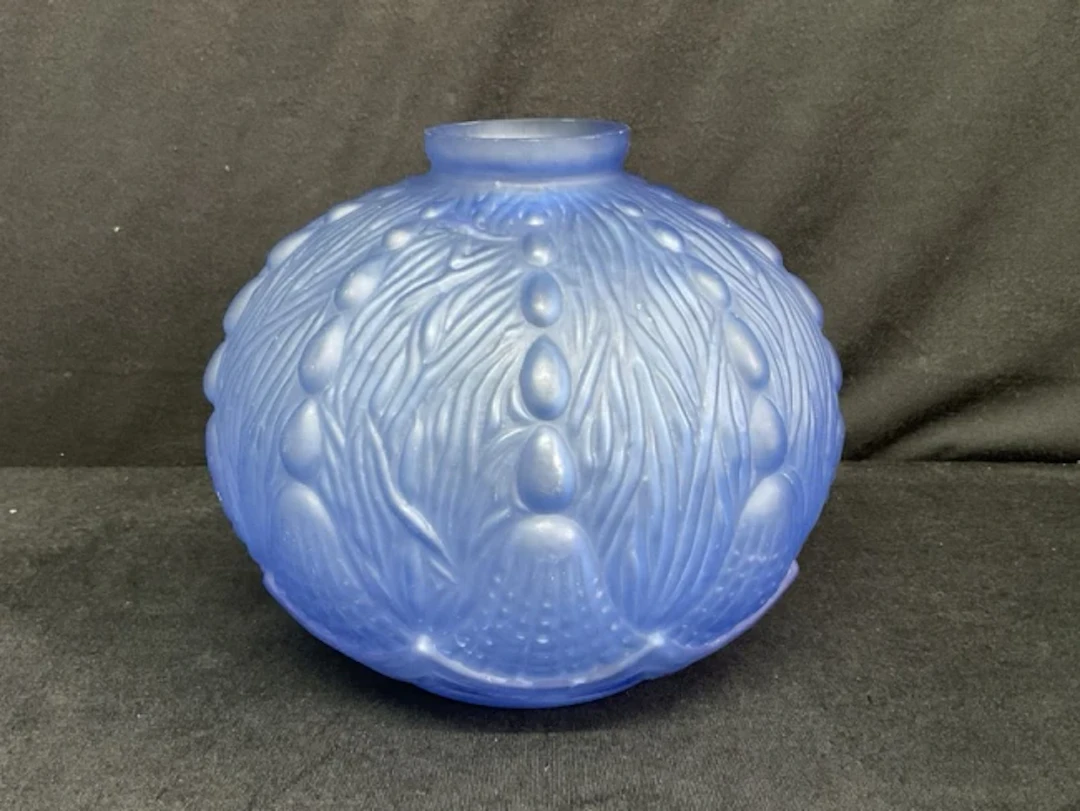 A Belgian deco Oreor mould blown glass vase in the form of a stylised