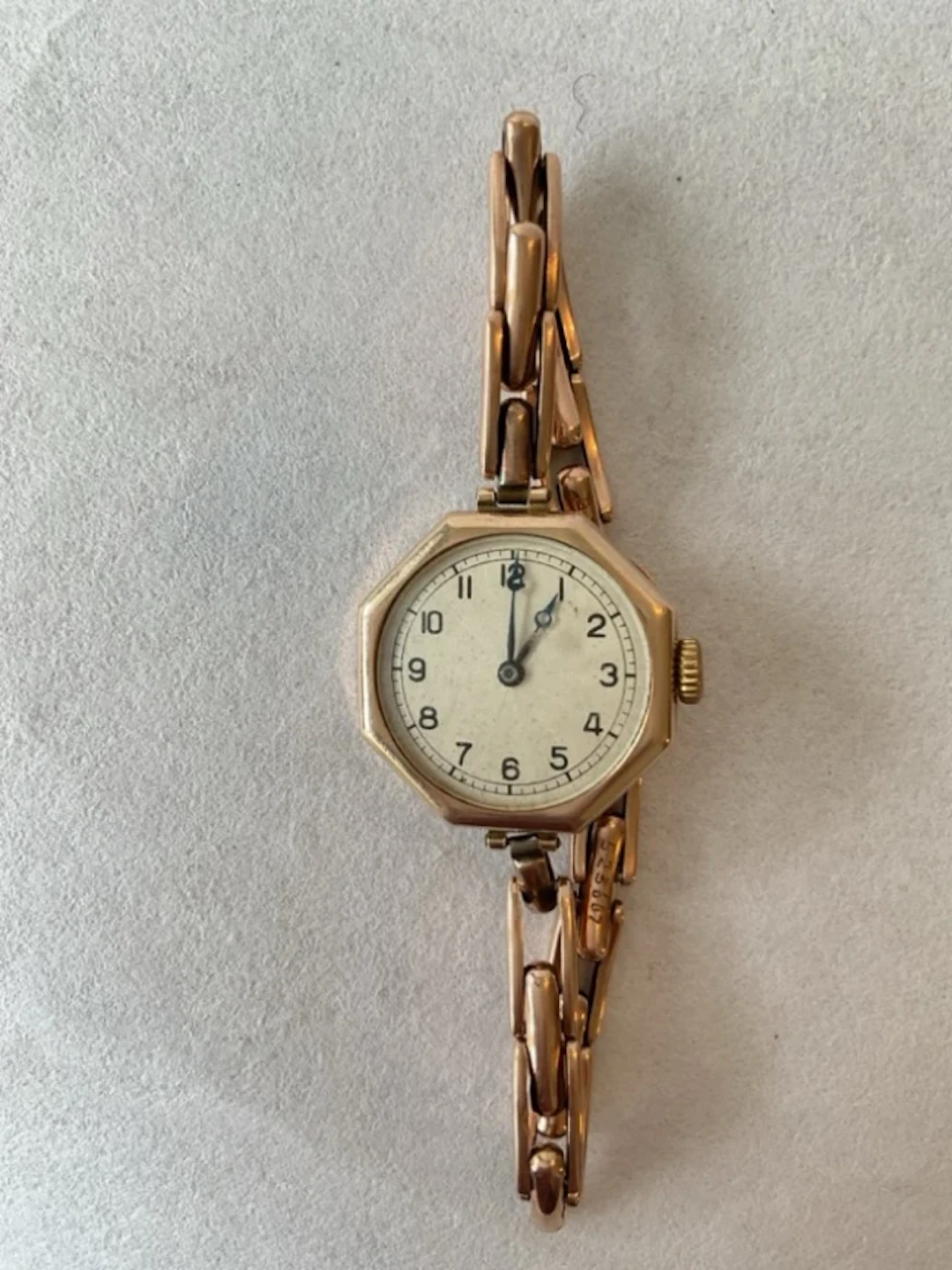 A deco ladies 9ct gold Rolex wristwatch, the circular engine turned
