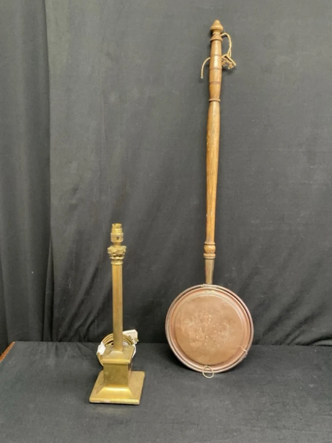 A brass corinthian column tablelamp with fluted column on a square
