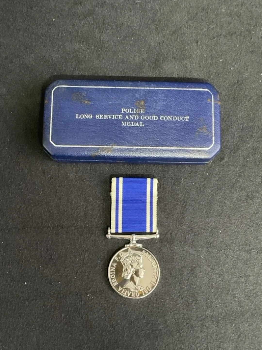A boxed Royal Mint Elizabeth II police long service & good conduct