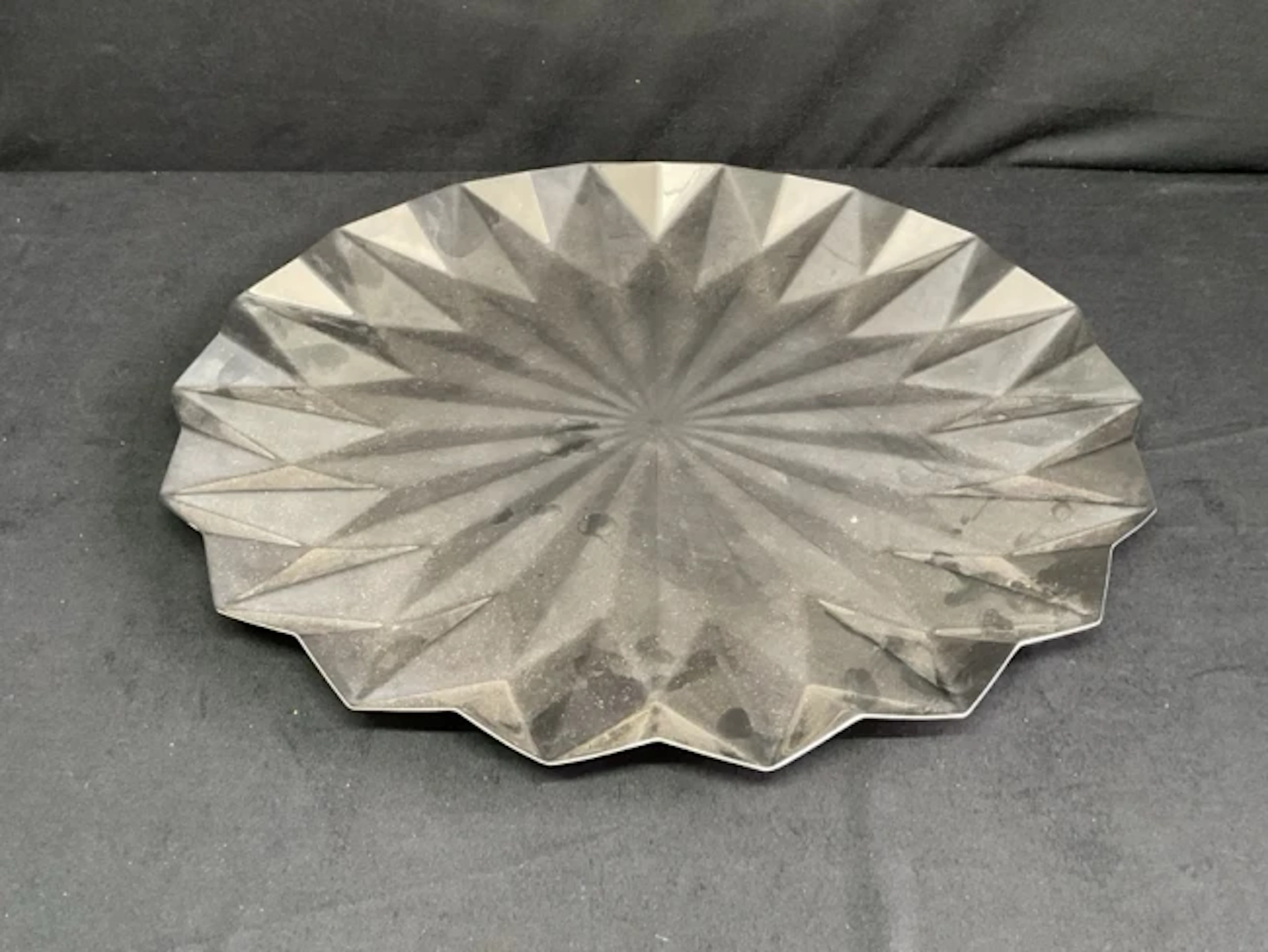 A Georg Jensen contemporary circular stainless steel Supernova tray