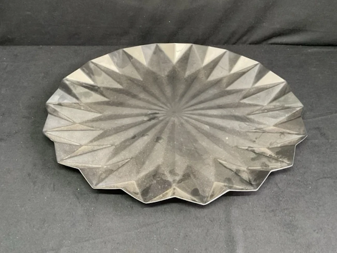 A Georg Jensen contemporary circular stainless steel Supernova tray
