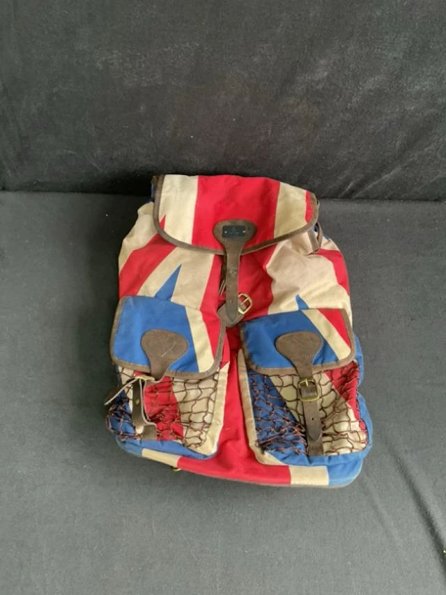 A Barbour waxed cotton Union Flag rucksack with draw-string opening