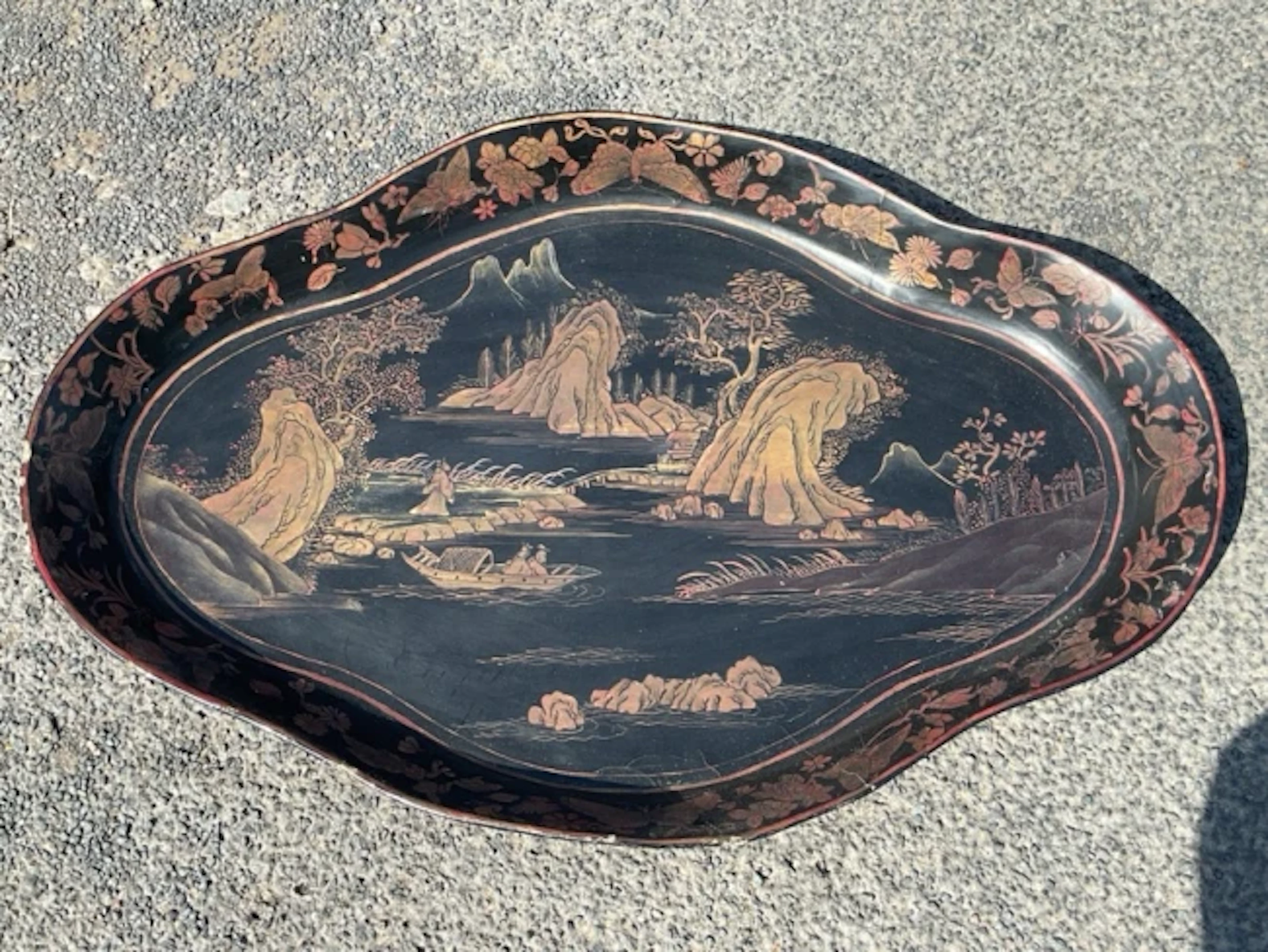 A Victorian oval mapiémachè scalloped tray, having deep splayed sides