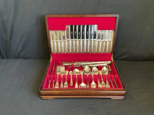 A mahogany canteen of silver plated kings pattern cutlery for eight