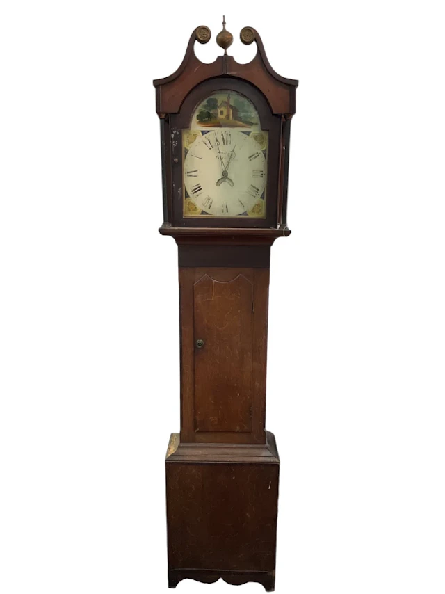 A nineteenth century oak longcase clock with swan neck pediment above
