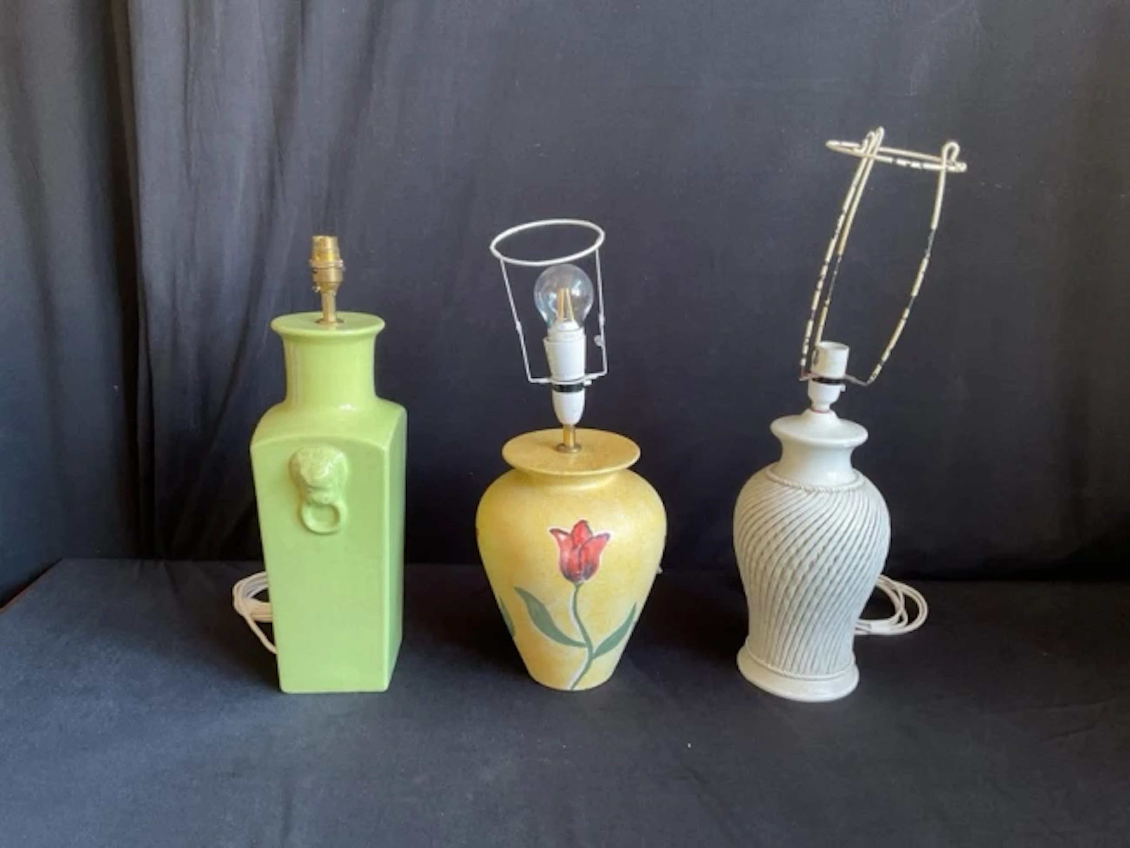 Three ceramic table lamps in the form of vases - green glazed with