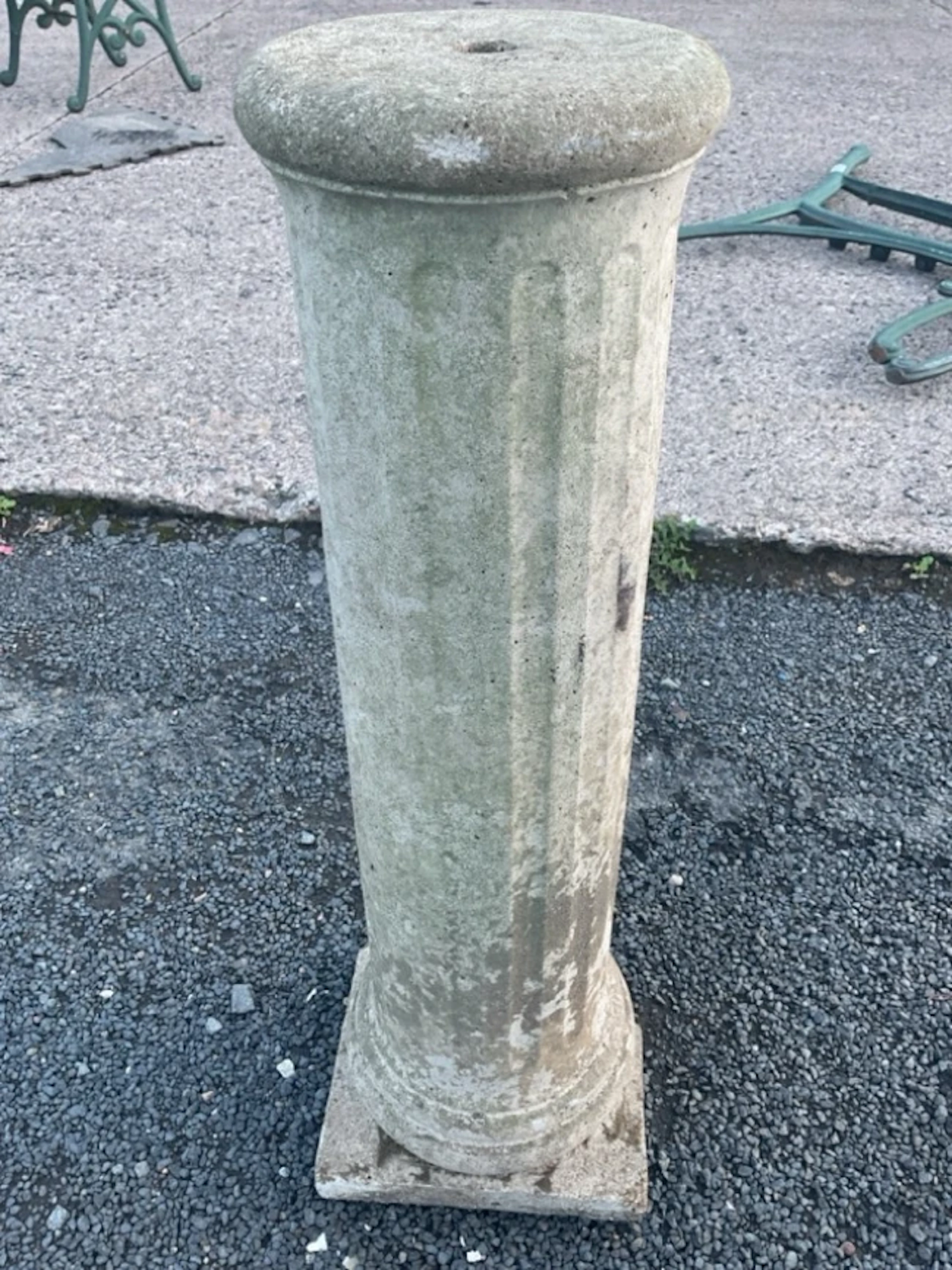 A composition stone column of fluted form, having moulded collar to