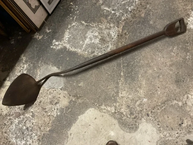 A Victorian wrought iron sweetheart peat shovel with heart shaped