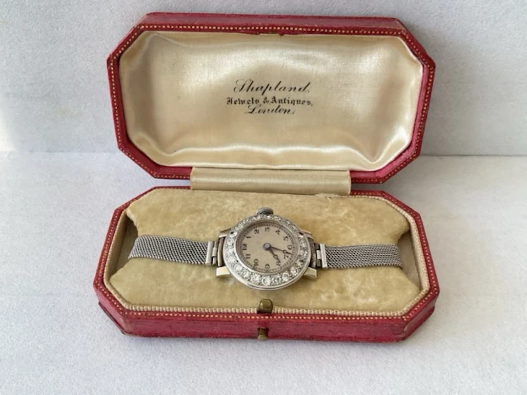 A boxed 18ct white gold wristwatch having circular dial with arabic