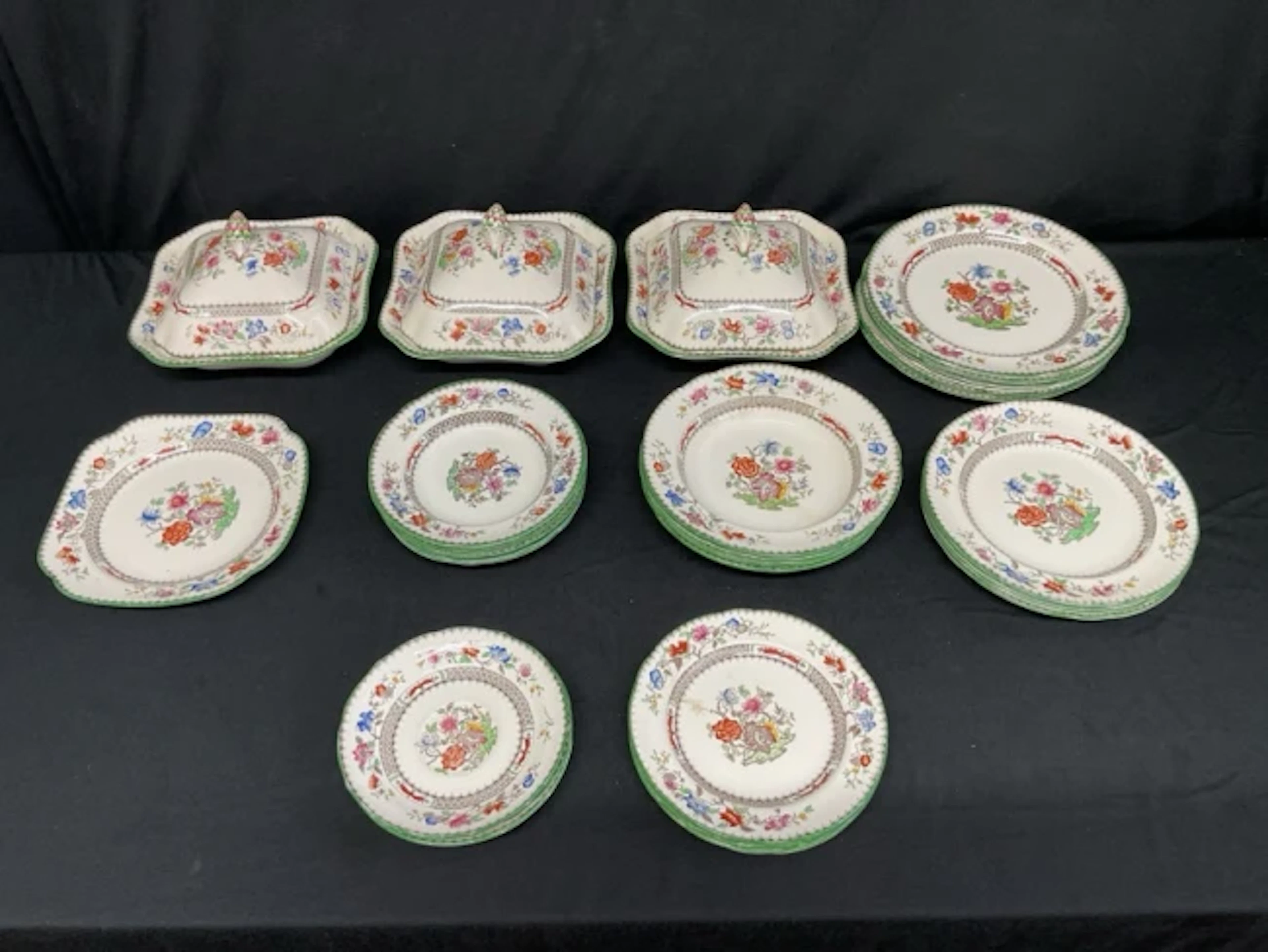 A Copeland Spode dinner service in the Chinese Rose pattern with tureens