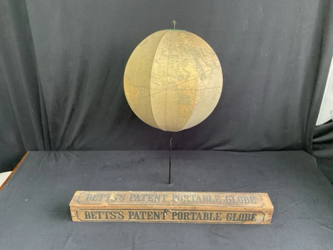 An 1880s boxed Betts's Patent Portable Globe published by George Philip