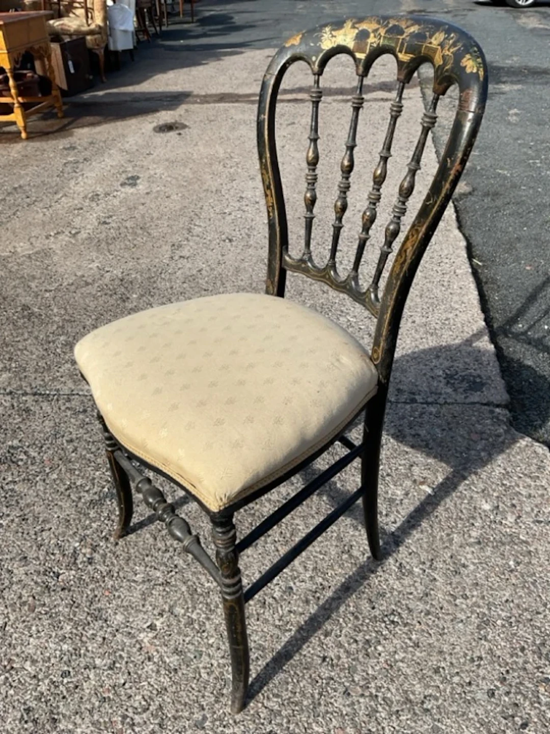A Victorian black japanned occasional chair the spoon back with gilt