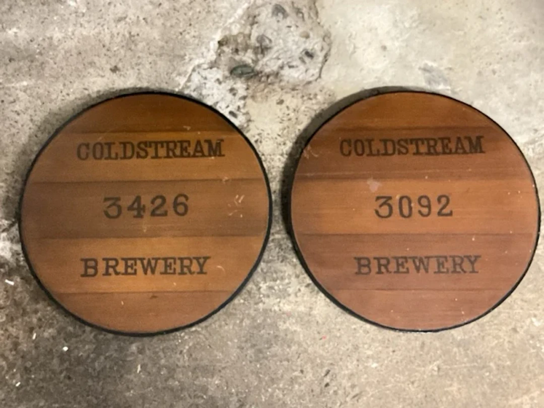 A pair of Coldstream Brewery pine cask ends numbered 3092 & 3496.(15.5in)