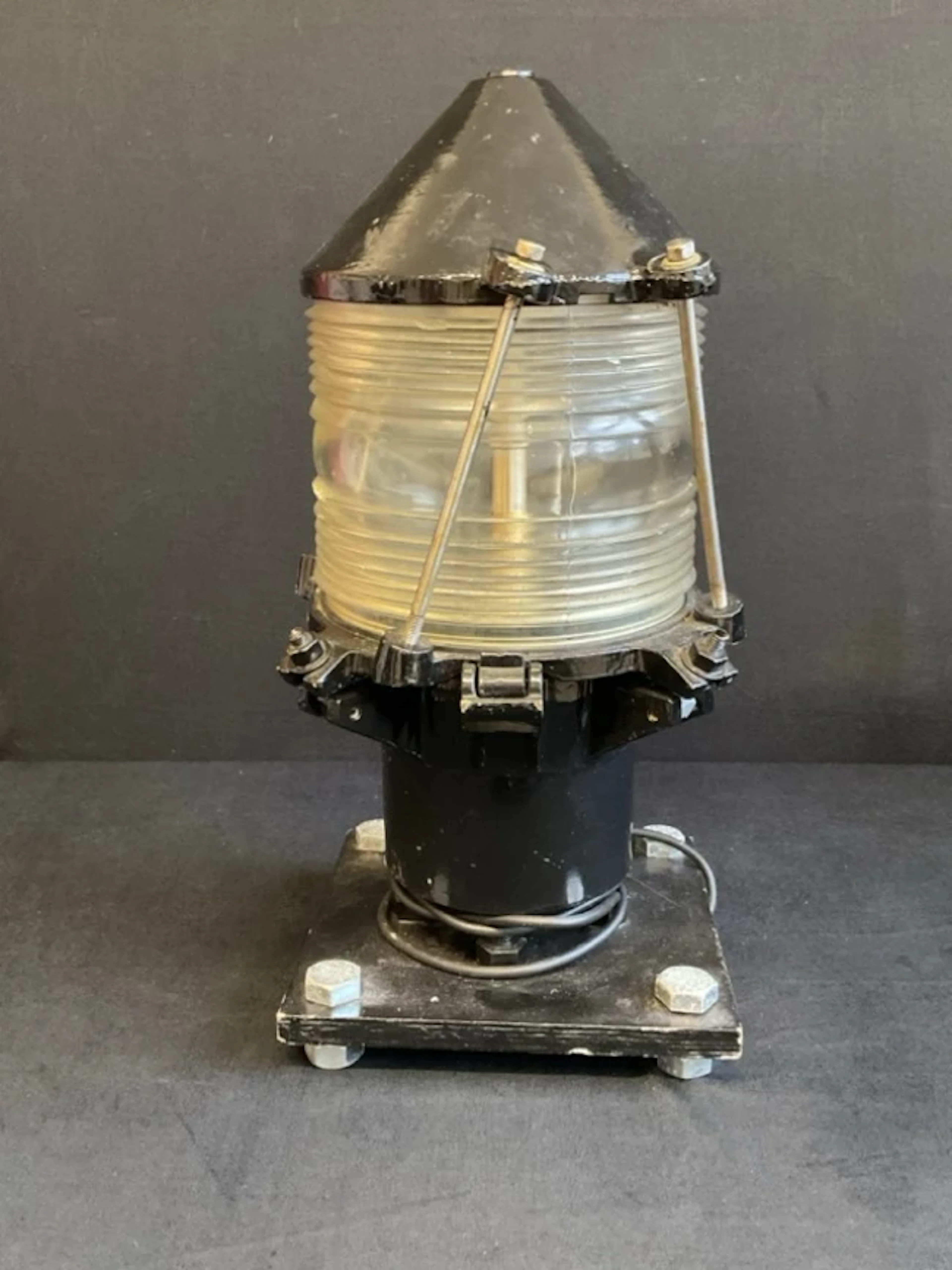 A painted brass marine buoy lantern by Automatic Power Ltd of Maidstone