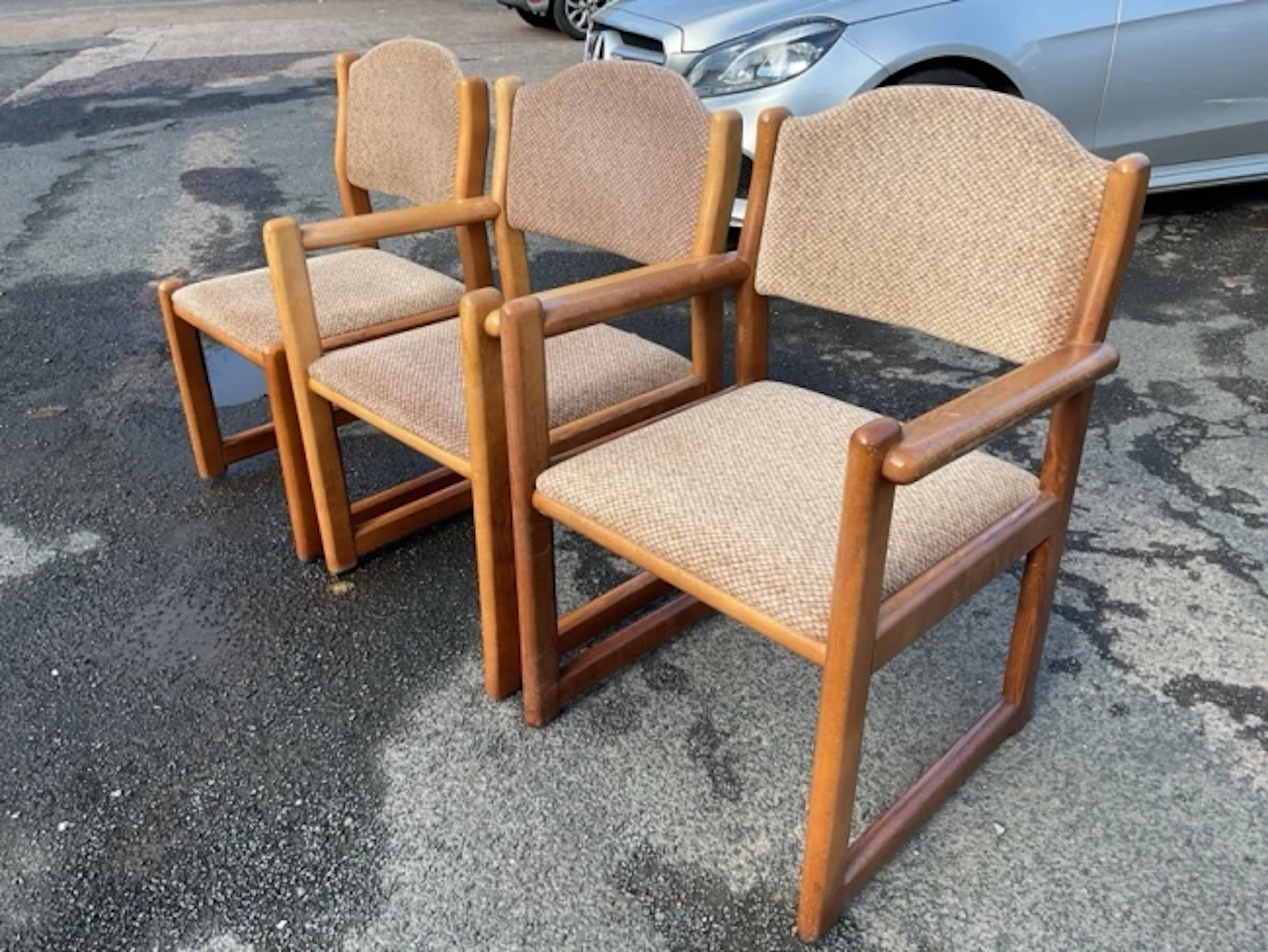A set of three Welzel beech armchairs with rectangular rounded frames