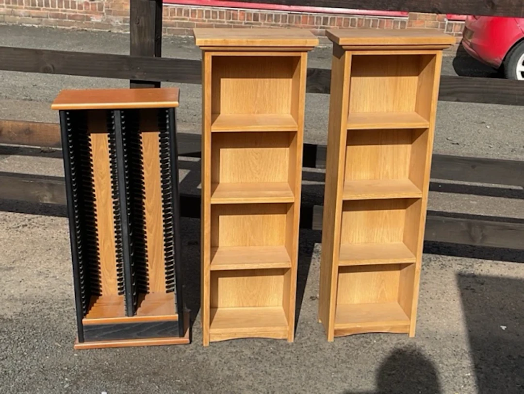 A pair of modern rectangular oak bookshelves with moulded tops and