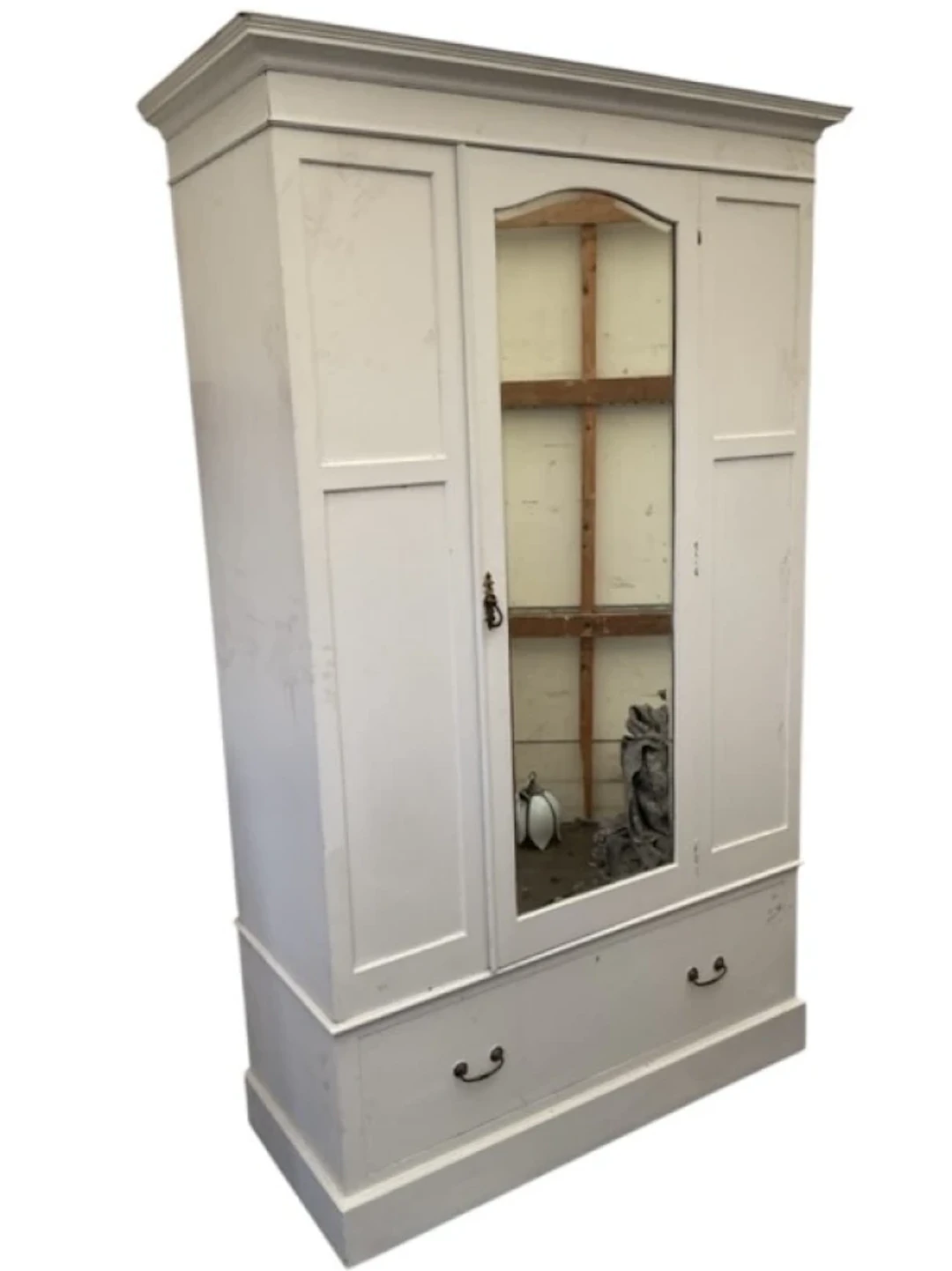 A painted Victorian wardrobe with moulded cornice above a central