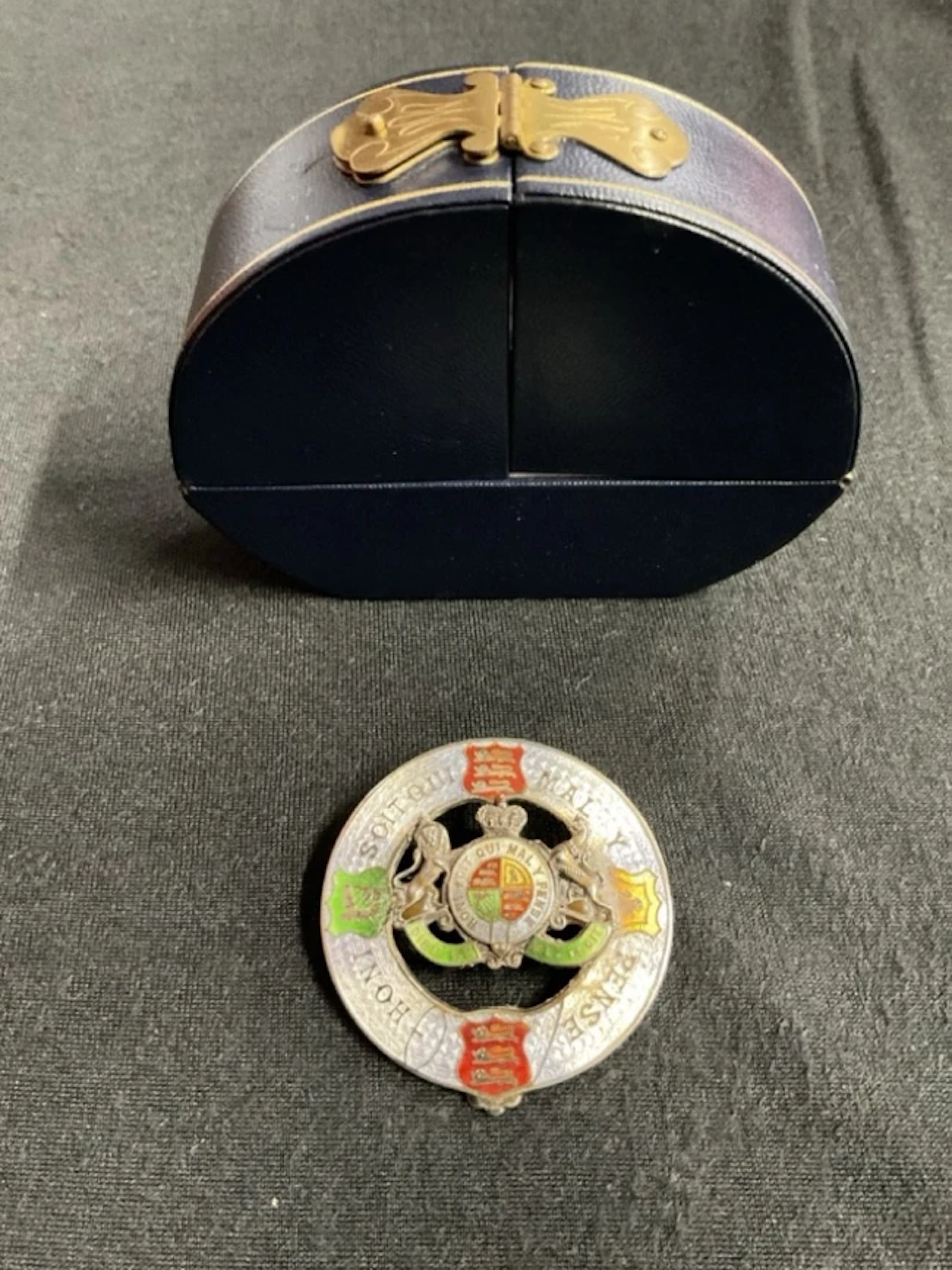 A circular Sterling silver and guilloche enamelled brooch, the outer