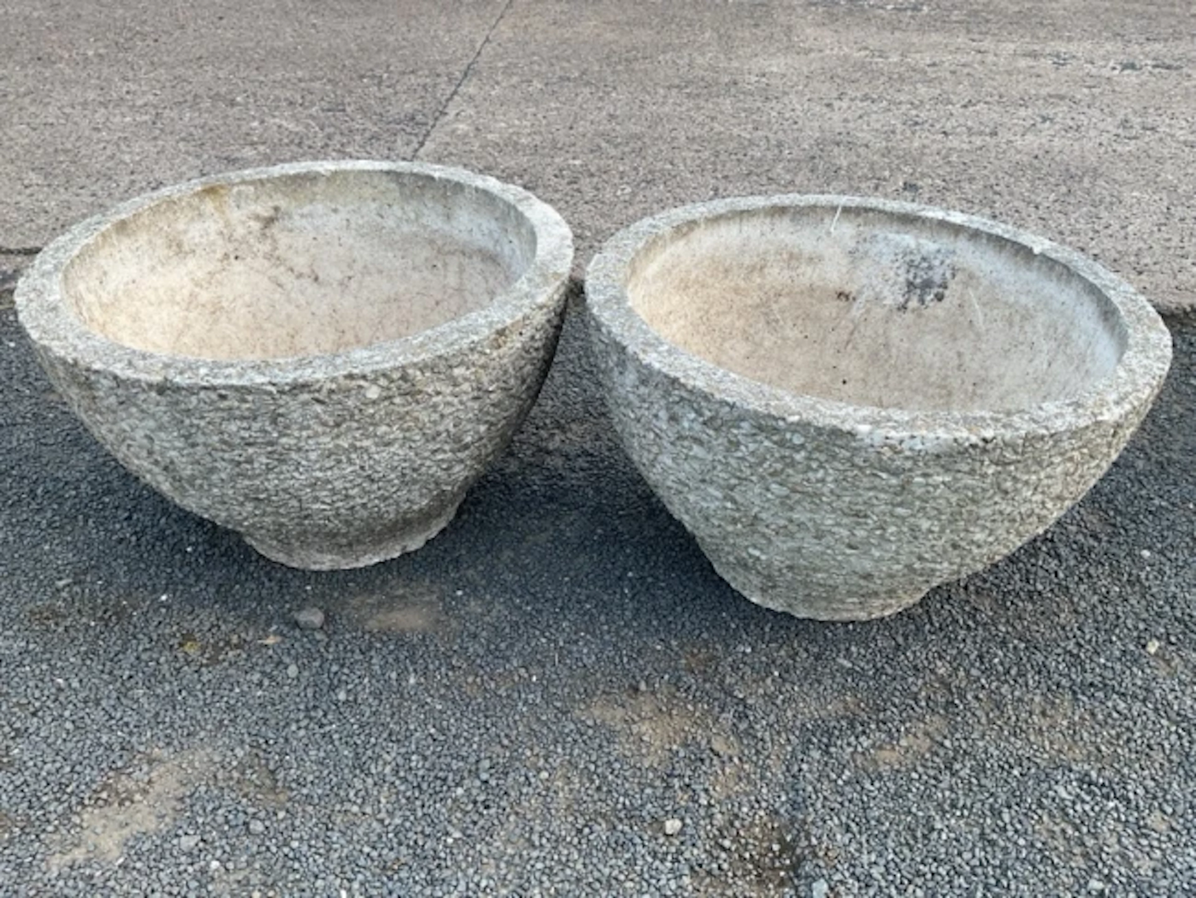 A pair of 60s circular tapering composition garden pots with pebbledash