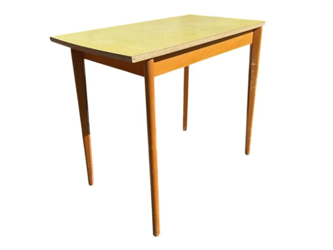 A 60s beech kitchen table, with rectangular formica top above a plain